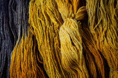 Textured Strands of Hand-Dyed Yarn in Earthy Tonesの写真素材