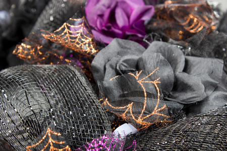 hand made halloween wreath crafted from black and spider web design meshの写真素材