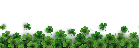 Seamless border with shamrock leaves. Saint Patrick seamless banner with cloverのイラスト素材