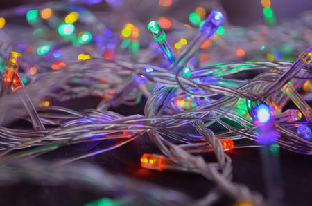 Christmas background, garland lights toys snowflakes snow glare night