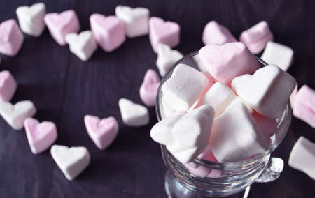 Marshmallow heart over pink background. Valentine's Day or Love conceptの写真素材