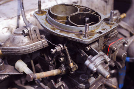 Carburetor of the internal combustion engine of a VAZ 2106. Automobile parts and spare parts.の写真素材