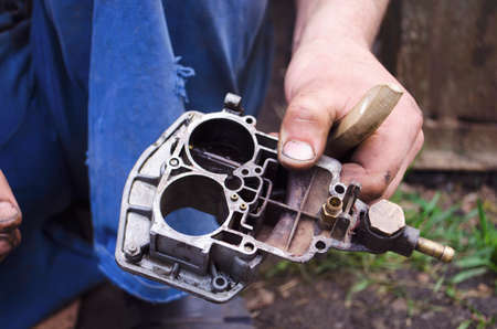 Carburetor of the internal combustion engine of a VAZ 2106. Automobile parts and spare parts.の写真素材