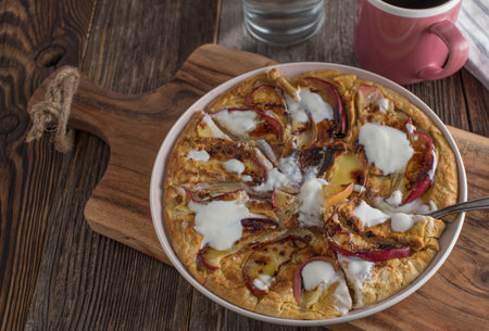 Healthy protein pancake made with eggs and ground oats. Pan fried with fresh apples and topped with...