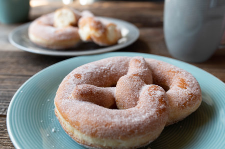 Sweet sugar pretzel. Traditional german yeast pastry or donut