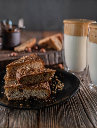 Dalgona coffee with delicious nut cakeの写真素材