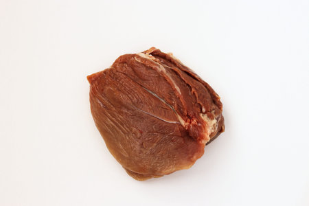 Pork flesh isolated on white background, top view