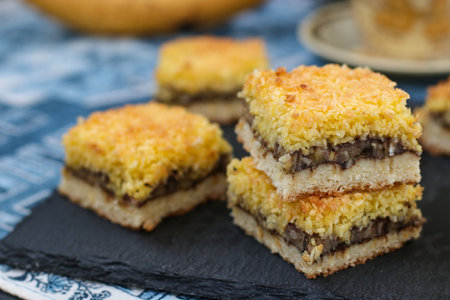 Homemade Banana cake with coconut flakes - festive dessert for Christmas, New Year, Close-up,...