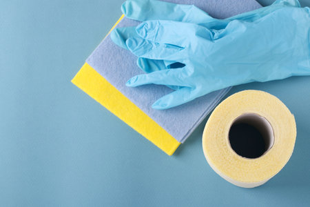 Toilet paper, gloves and cleaning napkins on a blue backgroundd, High unexpected demand, Deficit,...
