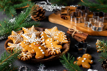 Homemade gingerbread cookies in the form of fabulous gingerbread men, snowflakes and christmas trees...