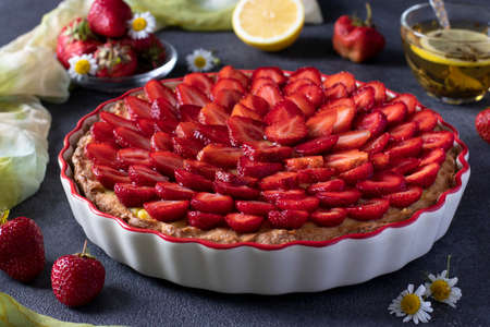 Delicious traditional homemade strawberry pie Crostata on dark background, Close-upの写真素材