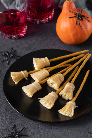 Witch brooms made of cheese and bread straw. The original idea of serving snacks to drinks for...