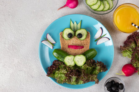 Frog vegetarian sandwich for kids with cucumber and radish, animal sandwichの写真素材