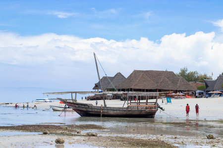 Boats on the shore during low tide, 8.12.2021, Africa, Zanzibar, Tanzaniaのeditorial素材