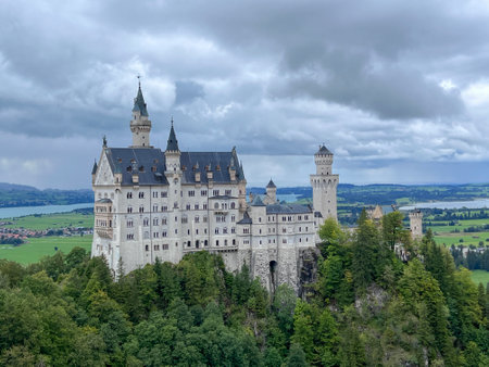 Neuschwanstein Castle in southern Germany with scenic mountain landscape, 19th century Bavarian landmarkの写真素材