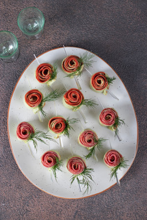 Lavash roses with cream cheese, sausage chorizo and salami. Appetizerの写真素材