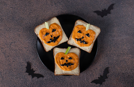 Sandwiches with scary pumpkins for Halloween partyの写真素材