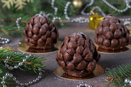 New Year chocolate cakes in shape of conesの写真素材