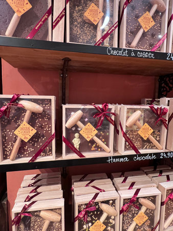 Boxed chocolate bar, Le Comptoir de Mathilde, complete with a wooden mallet, at one of Brussels chocolate shops, Belgium, September 6, 2025のeditorial素材