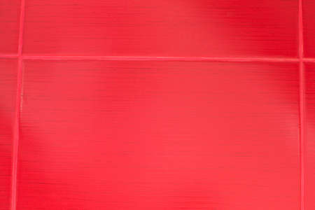 red tiles with seams as a backgroundの写真素材