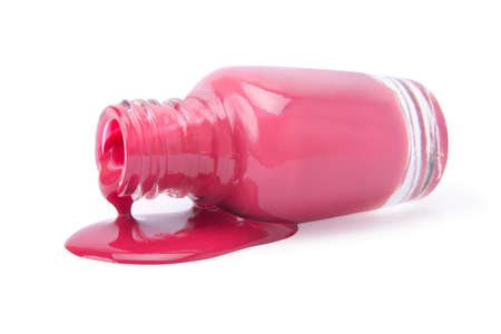 spilled nail polish in a pink color isolatedの写真素材