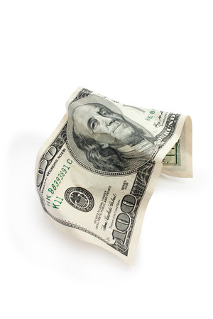 crumpled hundred dollar on a white background