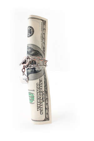 money entwisted by chain on a white background isolatedの写真素材