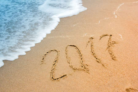 the inscription "2017" on the beachの写真素材