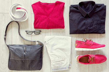 Set of men's clothes consist of trousers, sneakers, sweater, T-shirt, bag, belt and glasses
