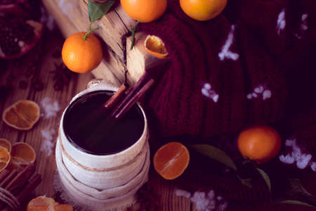 warm winter mug of tea and tangerines. Christmas still lifeの写真素材
