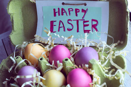 colorful easter eggs with inscriptionの写真素材