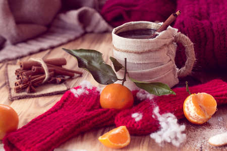 warm with a mug of tea and tangerines. Christmas still lifeの写真素材