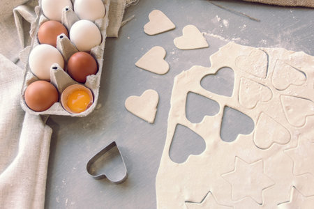 Cut out dough in the shape of heart and stars