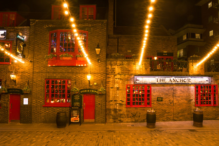 Picturesque London PUB at Night with Christmas Lightingsのeditorial素材