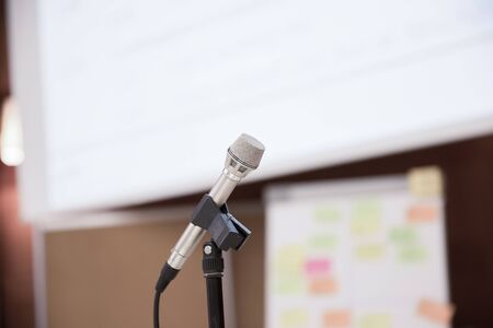 Public Speaker Microphone with white Projection Screenの写真素材