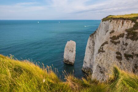 White Cliffs with Turquoise Atlantic Ocean on a Sunny Dayの写真素材