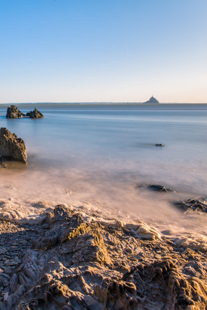 Atlantic Ocean Water Flowing in Mont Saint-Michel Bay in Normandy France - Portrait version