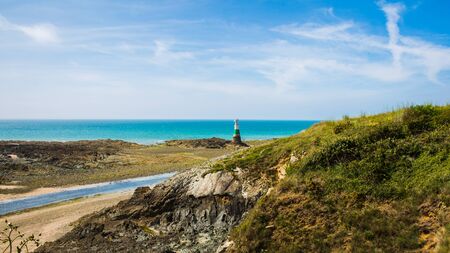 Pl? ? neuf-Val-Andr? ? Lighthouse with Turquoise Blue Atlantic Ocean on a Sunny Summer Day in Brittany Franceの写真素材