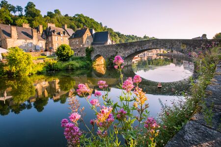 Dinan Old Medieval Bridge and Stone Houses Reflecting in Rance River in Bretagne, Cotes d'Armor, Franceの写真素材