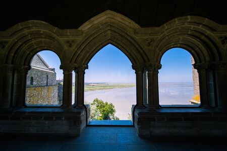 View of Mont Saint-Michel Bay from Abbey Window on a Sunny Summer Day in Normandy Franceの写真素材