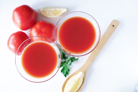 Alcoholic cocktail bloody Mary with lemonの写真素材