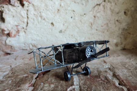 Toy small black airplane retro for collectorsの写真素材