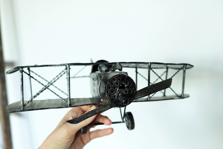 Toy small black airplane retro for collectorsの写真素材