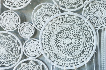 Beautiful delicate white lace woven in circlesの写真素材
