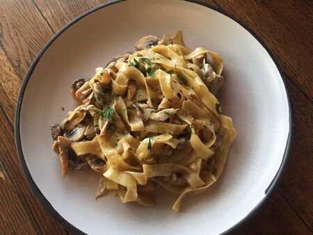Tagliatelle pasta with mushrooms and cream cheeseの写真素材