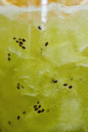 Refreshing lemonade with kiwi and iceの写真素材