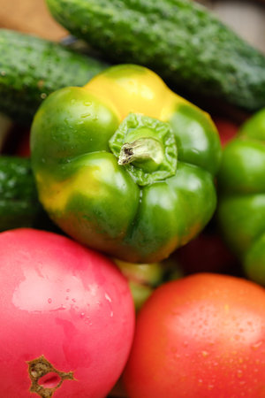 Fresh tasty vegetables on a wooden background viewの写真素材