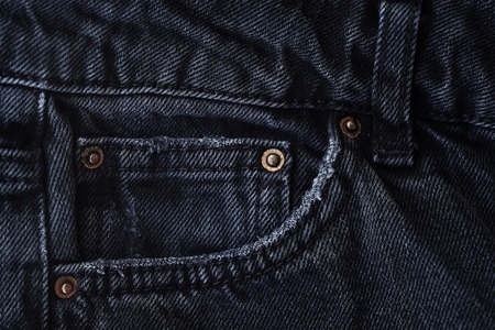Black denim jeans with pocket and labelの写真素材