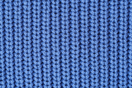 Beautiful blue wool knitted texture for clothesの写真素材
