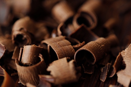 Delicious dark chocolate on a brown backgroundの写真素材